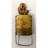 A GOOD QUALITY JAPANESE MEIJI PERIOD THREE CASE GOLD LACQUERED INRO, together with a carved