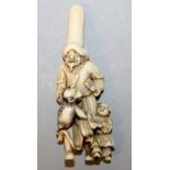 A RARE & FINE QUALITY JAPANESE EDO/MEIJI PERIOD IVORY NETSUKE OF A DUTCHMAN, the grimacing foreigner