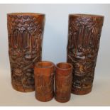 A LARGE PAIR OF 19TH/20TH CENTURY CHINESE BAMBOO BRUSHPOTS, each carved in deep relief with sages in