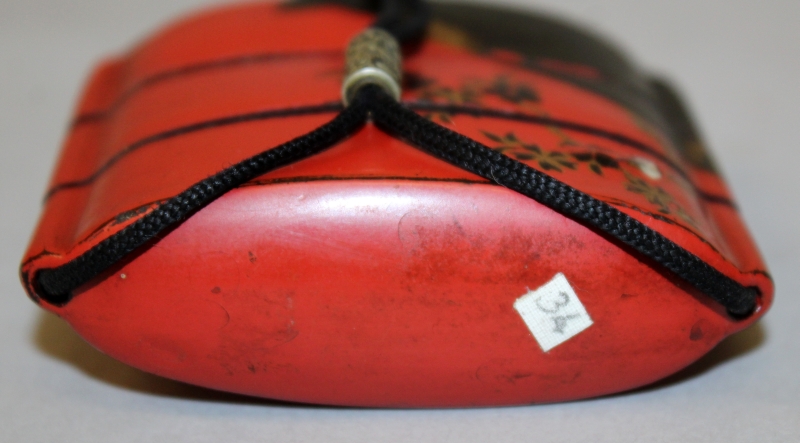 A JAPANESE EDO PERIOD RED GROUND LACQUER TWO CASE INRO, together with a small pierced cylindrical - Image 4 of 5