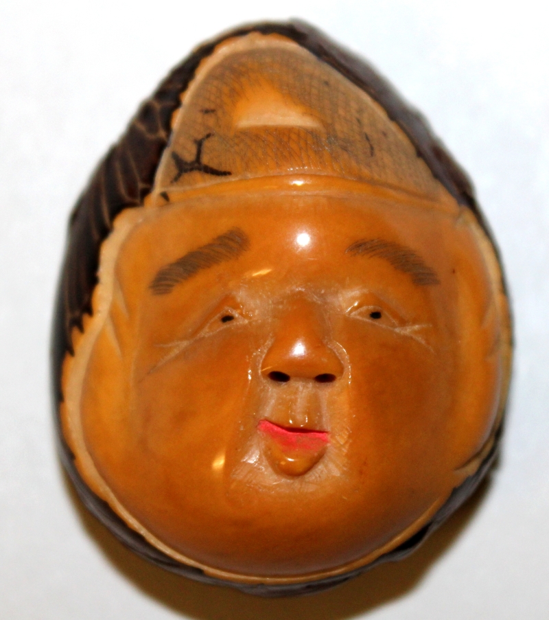 A SIGNED JAPANESE TAGUA NUT NETSUKE OF DAIKOKU, the deity's face with smiling expression, the - Image 2 of 6