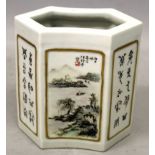 A CHINESE FAMILLE ROSE PORCELAIN BRUSHPOT, of waisted lozenge section, the sides decorated with