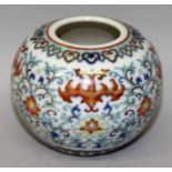 A SMALL CHINESE DOUCAI PORCELAIN WATER POT, decorated with bats above scrolling lotus, the base with