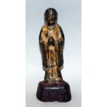 A GOOD 16TH/17TH CENTURY CHINESE GILT & LACQUERED BRONZE FIGURE OF A PRIEST, standing in flowing