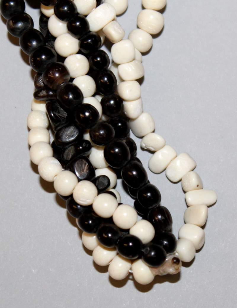 A GROUP OF FIVE BEAD NECKLACES, composed of various materials, and an ivory pendant and a brooch. ( - Image 4 of 7