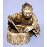 A SMALL GOOD QUALITY SIGNED JAPANESE MEIJI PERIOD OKIMONO OR NETSUKE, carved in the form of a seated