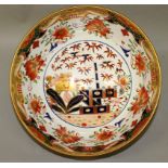 A 19TH SPODE IMARI PATTERN PUNCH BOWL (hair crack in base).