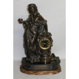 A LARGE 19TH CENTURY BRONZE GREEK CLASSICAL FIGURAL CLOCK, a female figure standing beside an