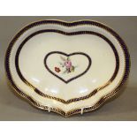 AN 18TH CENTURY CHELSEA DERBY HEART SHAPE DISH, centrally painted with flowers under three blue