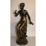 LUCIE SIGNORET-LEDIEU (1858-1904) FRENCH A GOOD BRONZE FIGURE OF A YOUNG LADY seated on a tree