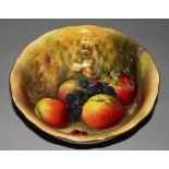 A ROYAL WORCESTER BOWL with shaped rim, hand painted with apples, blackberries and cherries under