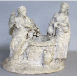 A PLASTER MACKET, classical figures besides a well.  10ins wide.