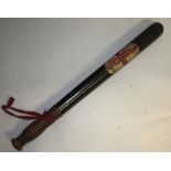 A WOODEN TRUNCHEON painted with ST. GEORGE'S CROSS. 18ins long.