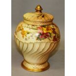 A ROYAL WORCESTER BLUSH IVORY POT POURRI VASE AND PIERCED COVER, painted with flowers, date code for