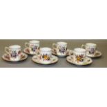 A ROYAL CROWN DERBY SET OF SIX COFFEE CAN AND SAUCERS decorated with flowers, date code for 1939.