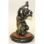 A SUPERB 19TH CENTURY BRONZE OF A KNEELING BACCHUS, a cupid on his knee. 8.5ins high, on a