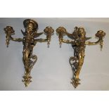 A RARE SET OF SIX 19TH CENTURY BRONZE TRIPLE LIGHT WALL SCONCES with winged classical figure