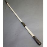 A PRESENTATION SILVER MOUNTED IVORY BATON.  20.5ins long. Presented to FLEET PAYMASTER, C. E. A.