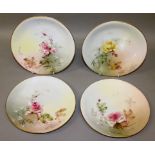 A ROYAL WORCESTER SET OF FOUR PLATES, finely painted with roses in Hadley style, date code for