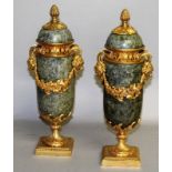 A GOOD PAIR OF LOUIS XVI DESIGN MARBLE AND ORMOLU CASSOLETTES AND COVERS with rams masks and