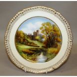 A 20TH CENTURY ROYAL CROWN DERBY PLATE, painted with a view of Haddon Hall by D. Hague, signed and a