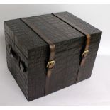 A FAUX CROCODILE LEATHER SMALL TRAVELLING TRUNK, with buckled straps and carrying handles. 1ft