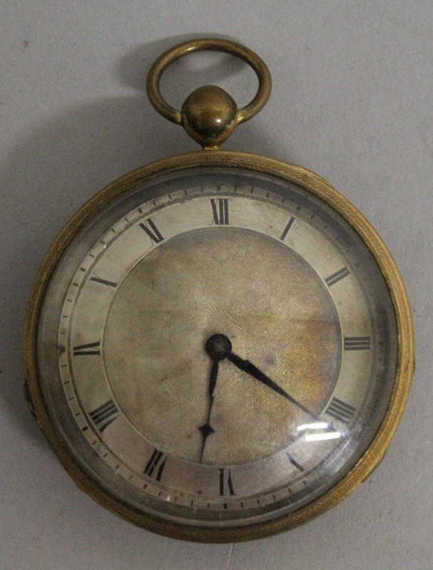 A 19TH CENTURY FRENCH POCKET WATCH by BUFFET, PALAIS ROYAL with silvered face in a gilt metal case.