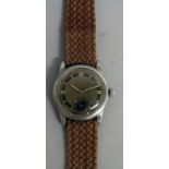A LADIES HEUER SKIPPER YACHTING WRISTWATCH with woven strap, No. 423884.