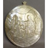 A CARVED MOTHER-OF-PEARL SHELL, Madonna and Child and The Three Kings. 3.25ins x 2.75ins.