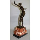AFTER D. H. CHIPARUS A BRONZE DANCING GIRL, arms outstretched. Signed.  14ins high, on a marble