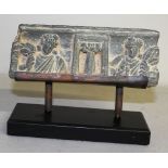 A SMALL EARLY INDIAN GANDHARA CARVED STONE PANEL.  7ins long.