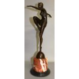 AFTER J. PHILIPP A BRONZE DANCING GIRL, arms outstretched. 16ins high, on a marble plinth.