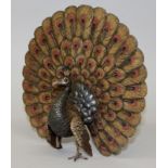 G. A. SHULTZ A GOOD AUSTRIAN COLD CAST AND PAINTED PEACOCK showing its fan. Signed.  8.25ins high.