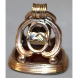 A GEORGIAN GOLD MOUNTED FOB SEAL, the rounded rectangular armorial incised intaglio, with reeded