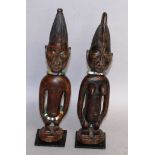 A PAIR OF 19TH CENTURY IBEJI TWIN FIGURES, OYO-YORUBA PEOPLE, SHAKI, NIGERIA.