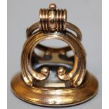 AN EARLY 19TH CENTURY GOLD MOUNTED FOB SEAL, the oval armorial incised rock crystal intaglio, with