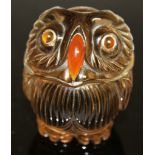 A CARVED GREEN CRYSTAL "FABERGE" OWL with gold and ruby eyes. 5cms high.