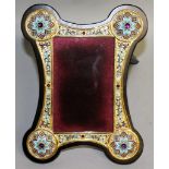 A VERY GOOD RUSSIAN SILVER AND ENAMEL EASEL MIRROR with shaped frame, face roundels and cabochon