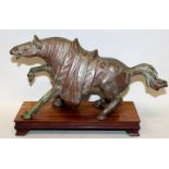 A 20TH CENTURY CHINESE BRONZE HORSE, together with a fitted wood stand, the horse in a startled