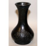 AN UNUSUAL 19TH CENTURY CHINESE ISLAMIC MARKET BRONZE VASE, the sides of the bottle-form body cast