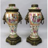 A PAIR OF 19TH CENTURY CHINESE CANTON PORCELAIN VASES & COVERS, with good quality French ormolu