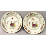 A SMALL PAIR OF 18TH CENTURY CHINESE QIANLONG PERIOD FAMILLE ROSE PORCELAIN PLATES, each painted