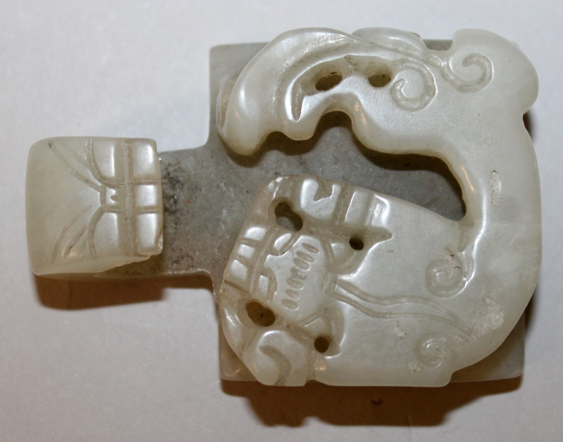 A CHINESE TWO-SECTION CELADON JADE-LIKE BELT BUCKLE, decorated in relief with chilong, 4.5in wide - Image 7 of 8