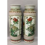 A LARGE PAIR OF FAMILLE VERTE PORCELAIN SLEEVE VASES, each painted with panels of seasonal foliage