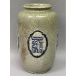 A 20TH CENTURY CHINESE CRACKLEGLAZE PORCELAIN VASE, the sides moulded with raised quatrefoil