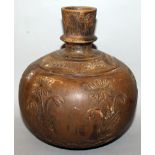 AN INDO-PERSIAN STONEWARE HOOKAH BASE, the sides carved in relief with repeated floral sprays, 8.1in