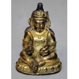 A SMALL GOOD QUALITY SINO-TIBETAN BRONZE FIGURE OF VAISHRAVANA, the guardian seated in lalitasana on