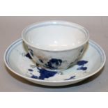 AN 18TH CENTURY CHINESE NANKING CARGO PORCELAIN TEABOWL & SAUCER, each piece painted with a garden