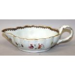 AN 18TH CENTURY CHINESE QIANLONG PERIOD FAMILLE ROSE PORCELAIN SAUCEBOAT, painted with an