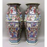 A GOOD LARGE PAIR OF 19TH CENTURY CHINESE CANTON FAMILLE ROSE PORCELAIN VASES, each hexagonal-